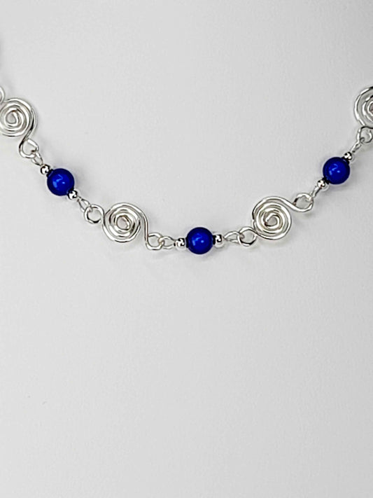 Dainty Silver Spiral Necklace with Blue Miracle Beads, Handmade Lightweight Jewellery