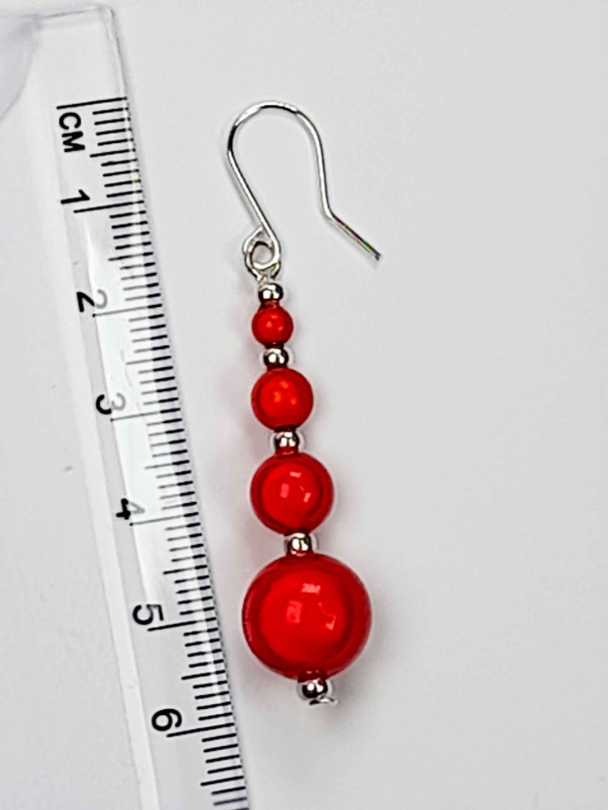 Bright Red Miracle Bead Earring With Ruler Showing 6cm Drop