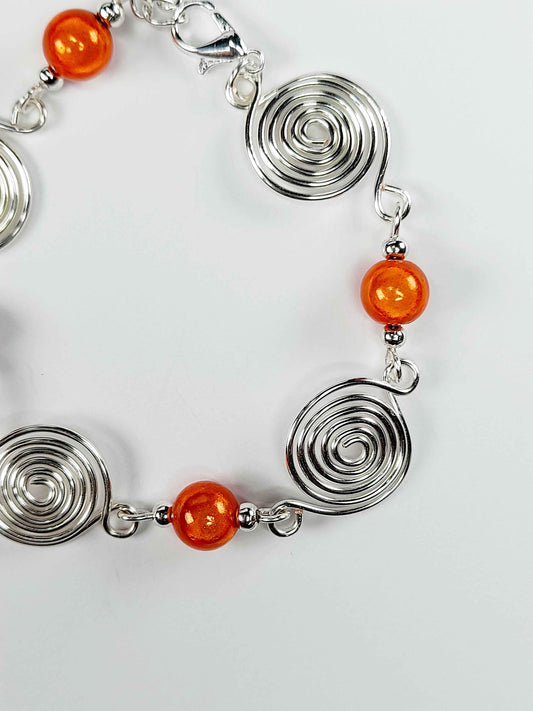 Dainty Silver Spiral & Orange Bead Bracelet – Handmade Adjustable Design