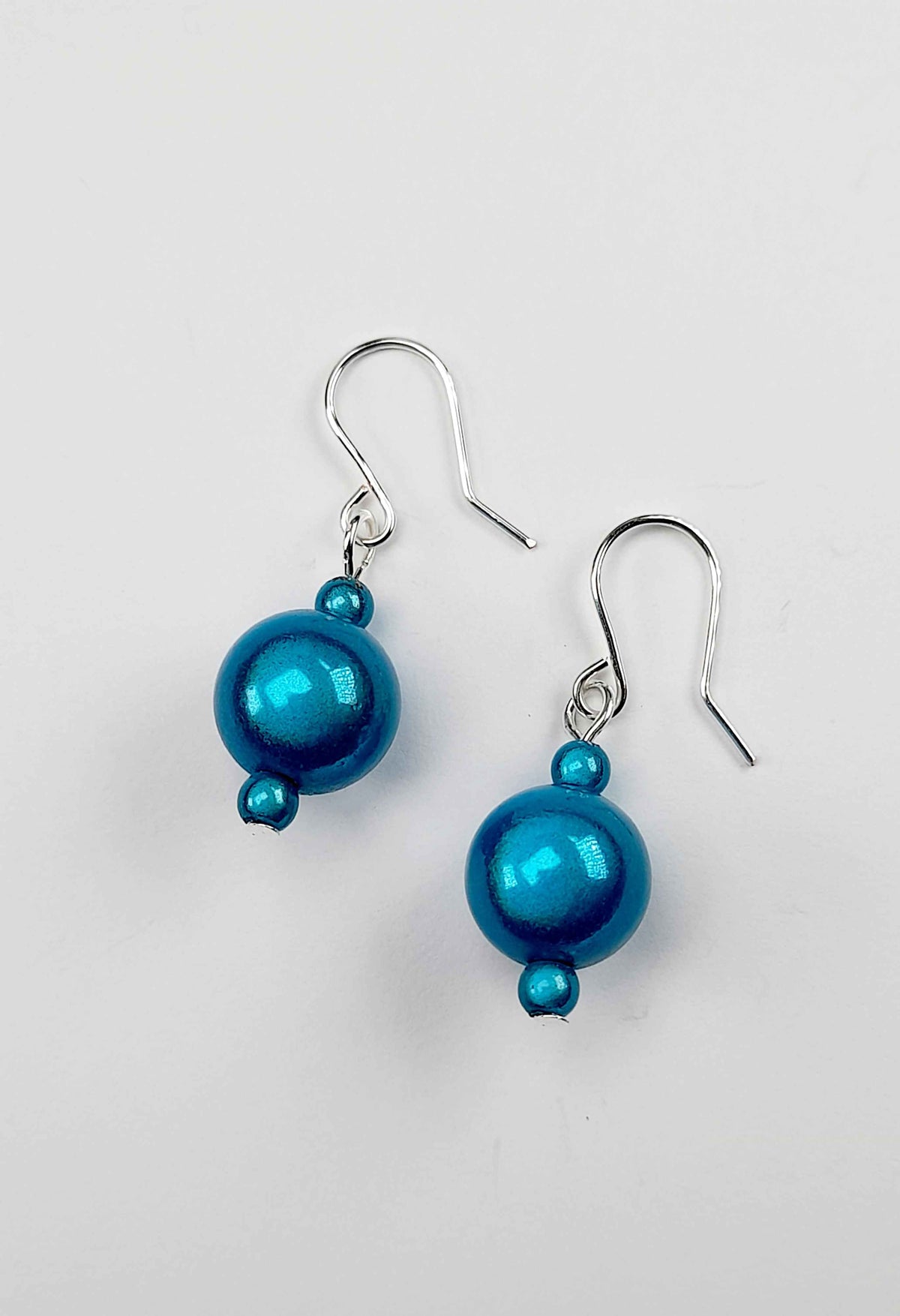 Handmade Silver Dangle Earrings with Turquoise Luminescent Beads