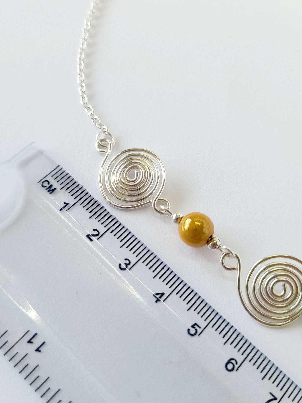 Silver Spiral & Yellow Bead Necklace – Handmade Design