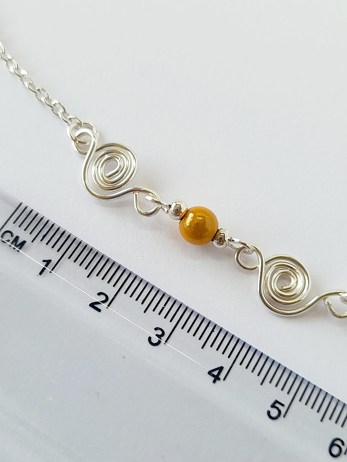 Dainty Silver Spiral & Yellow Bead Necklace – Handmade Design