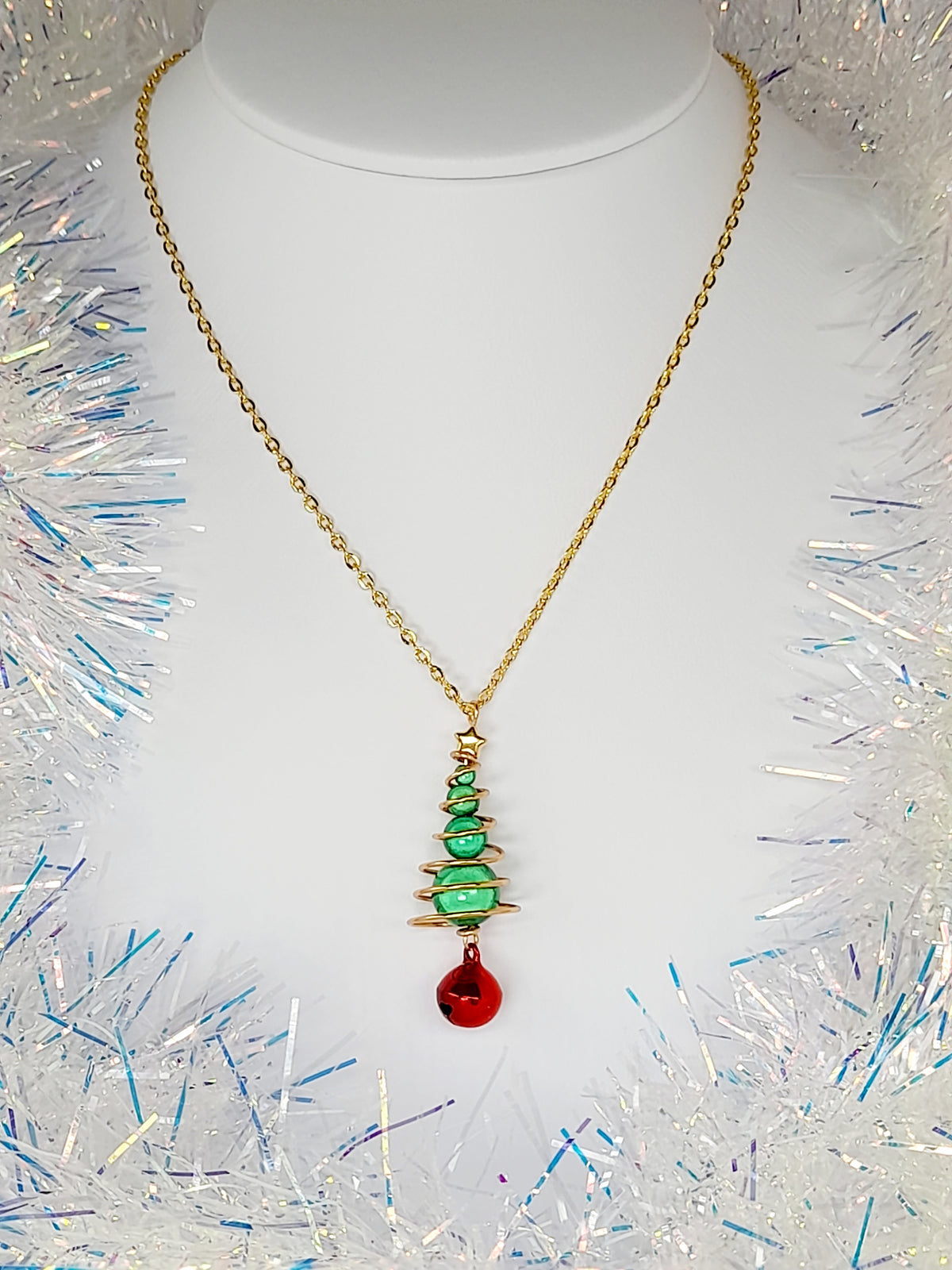 Green Miracle Bead Christmas Tree Earrings with Gold Wire and Red Jingle Bell - Just My Jewellery Shop