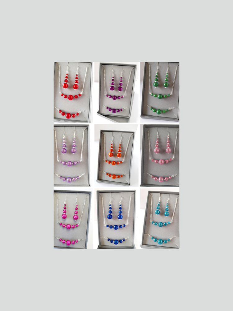 A 3x3 collage of bead jewellery sets in pinks, blue, green, red, orange and purples, comprising earrings, necklace and bracelet.