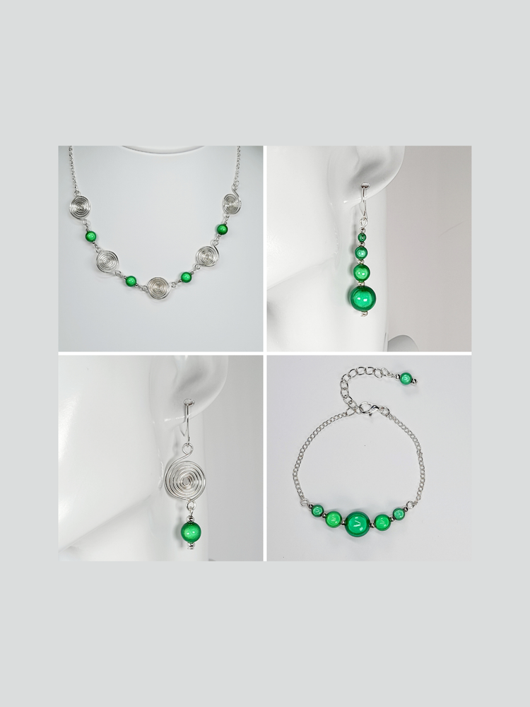 Bright green miracle bead drop earrings and bracelet, bright green and silver spiral earrings and necklace displayed on a white backgound.