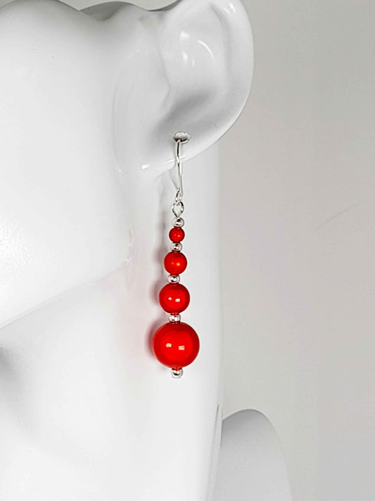Bright  Red Miracle Bead Earring  With Silver Plated Ear Wires Displayed on Mannequin Head