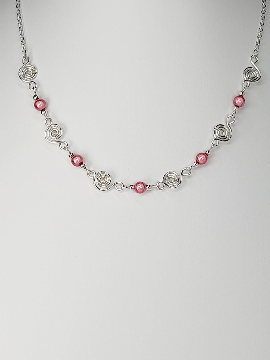 Dainty Silver Spiral Necklace with Pale Pink Miracle Beads,  Handmade Lightweight Jewellery