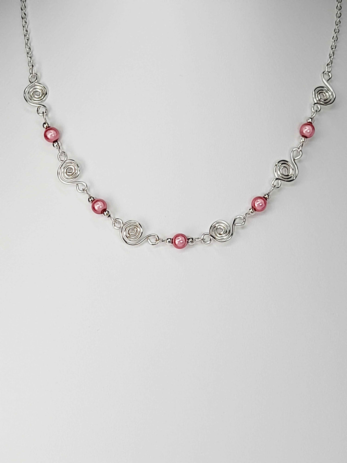 Dainty Silver Spiral Necklace with Pale Pink Miracle Beads,  Handmade Lightweight Jewellery