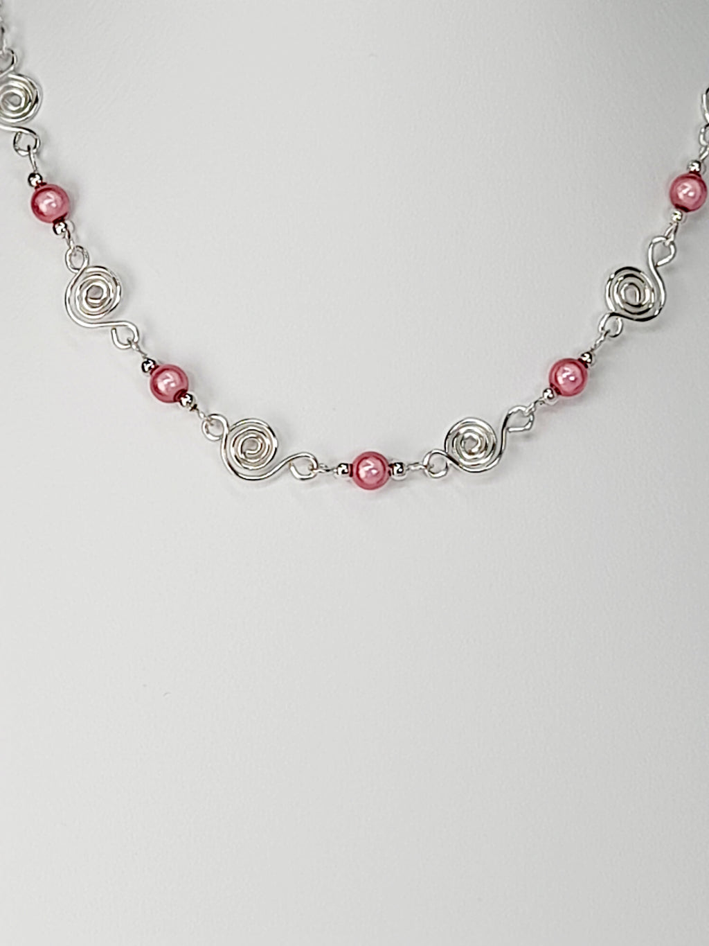 Dainty Silver Spiral Necklace with Pale Pink Miracle Beads,  Handmade Lightweight Jewellery