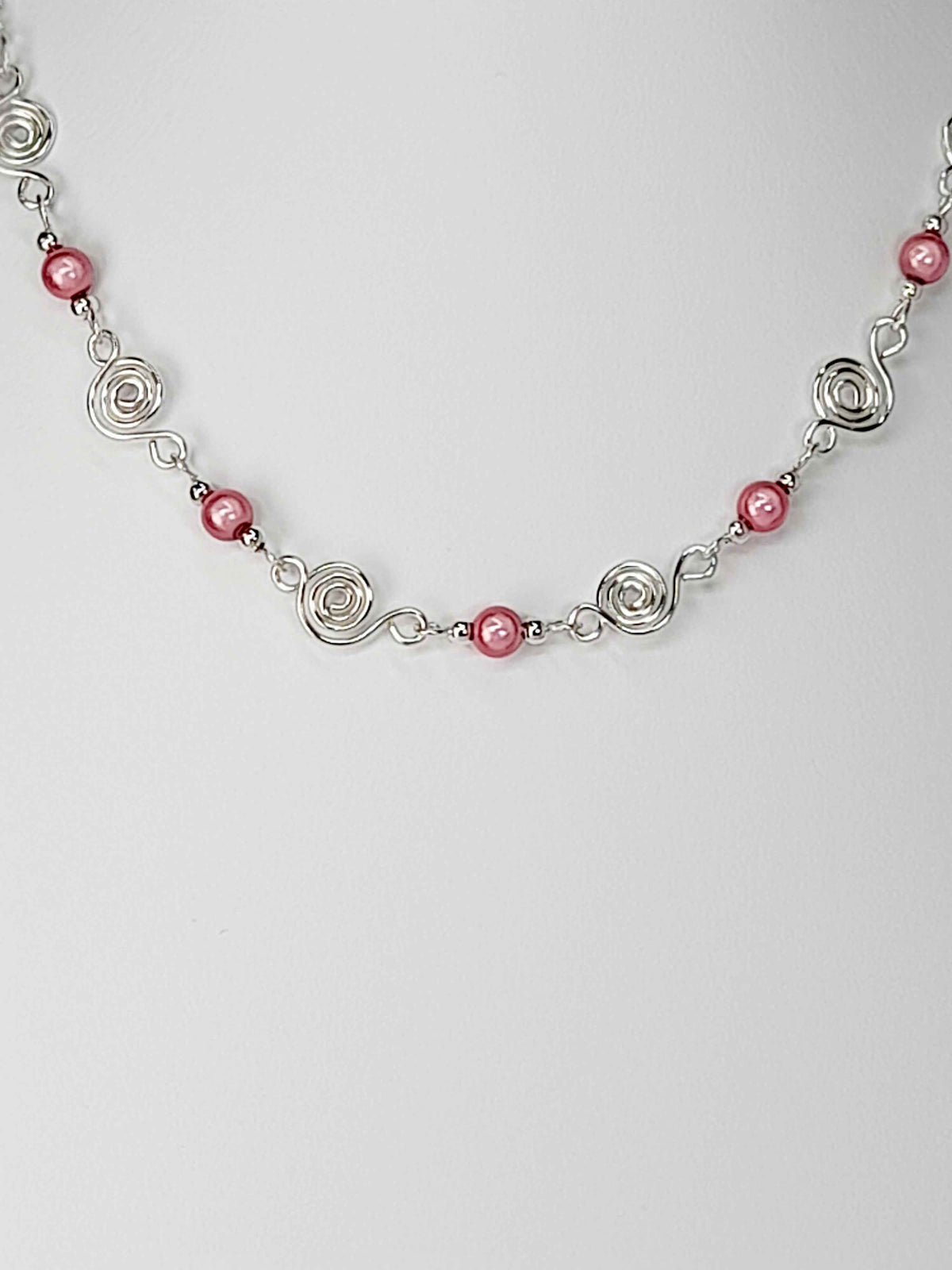 Dainty Silver Spiral Necklace with Pale Pink Miracle Beads,  Handmade Lightweight Jewellery