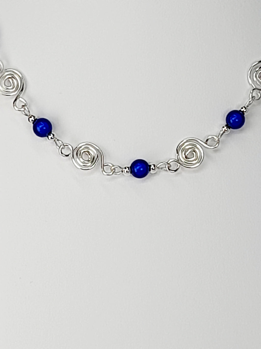 Dainty Silver Spiral Necklace with Blue Miracle Beads,  Handmade Lightweight Jewellery