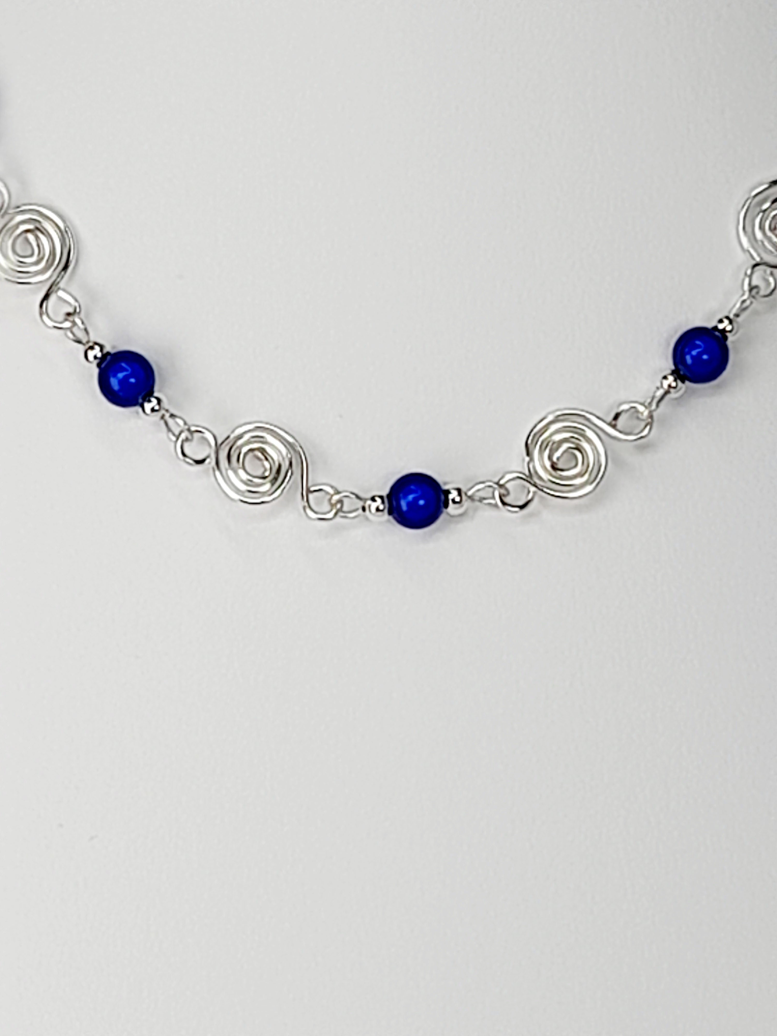 Dainty Silver Spiral Necklace with Blue Miracle Beads,  Handmade Lightweight Jewellery
