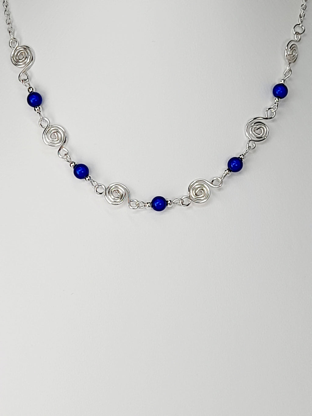 Dainty Silver Spiral Necklace with Blue Miracle Beads,  Handmade Lightweight Jewellery