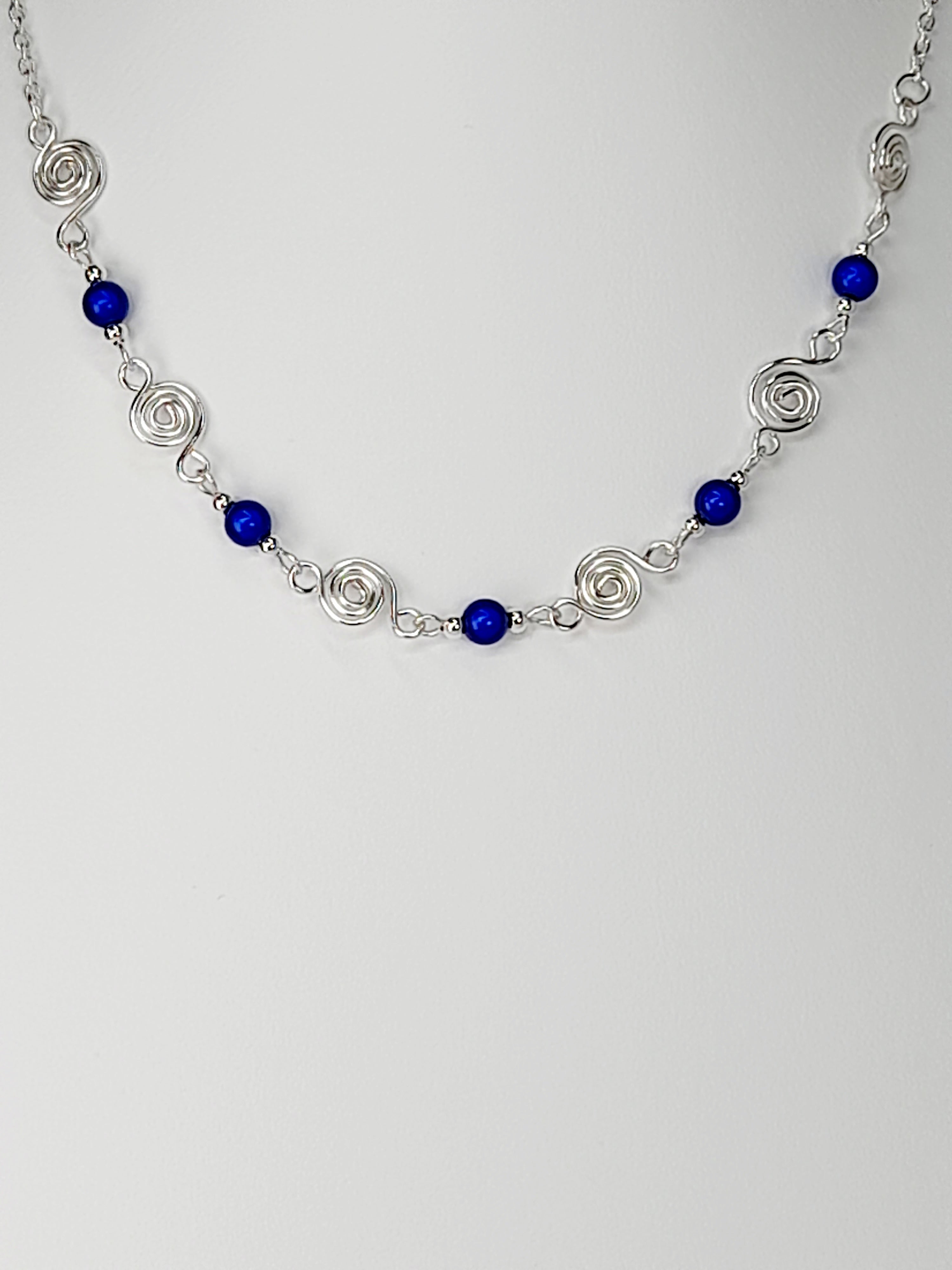 Dainty Silver Spiral Necklace with Blue Miracle Beads,  Handmade Lightweight Jewellery