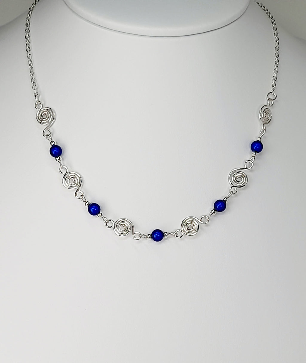 Dainty Silver Spiral Necklace with Blue Miracle Beads,  Handmade Lightweight Jewellery