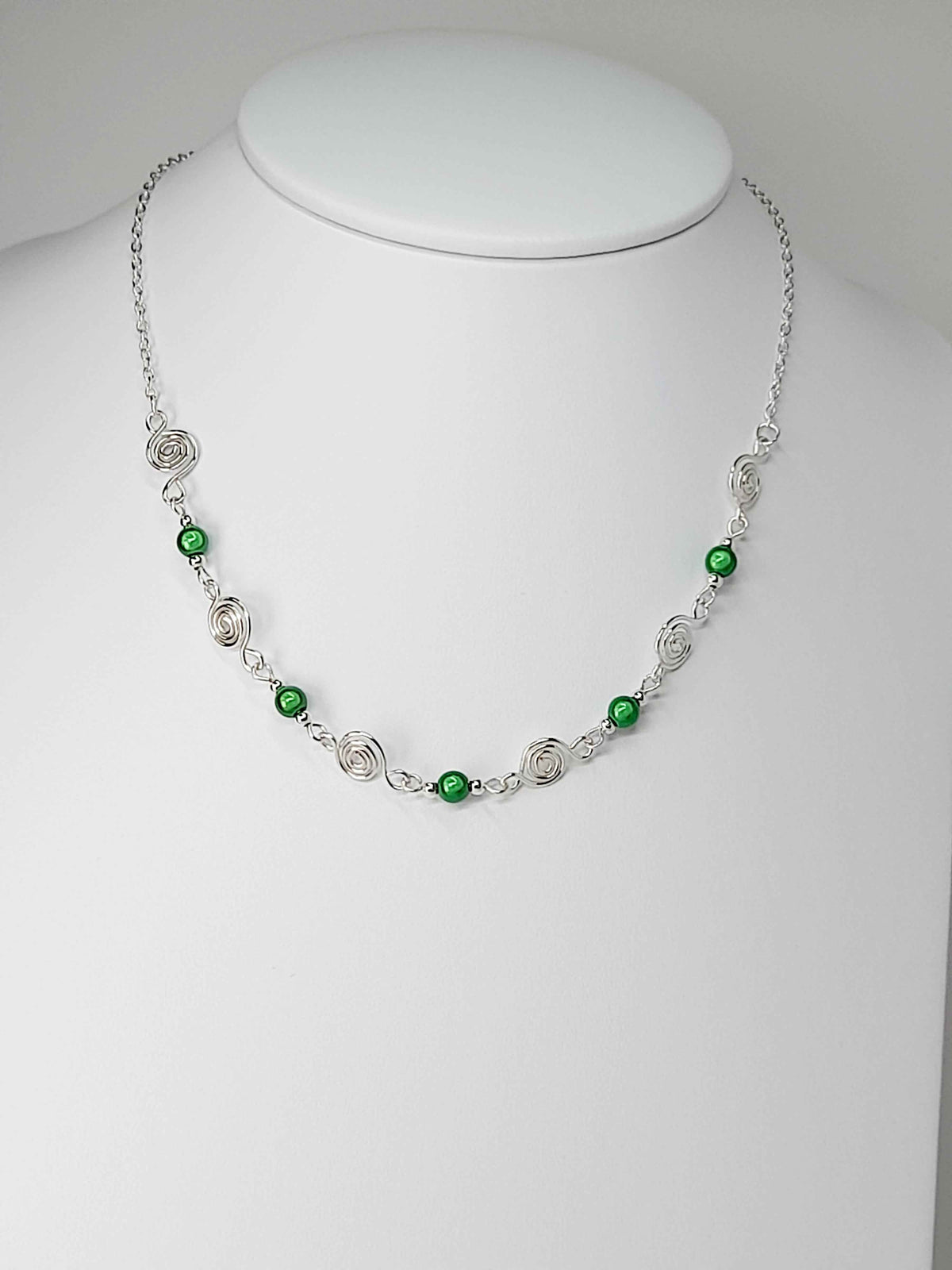Dainty Silver Spiral Necklace with Green Miracle Beads,  Handmade Lightweight Jewellery