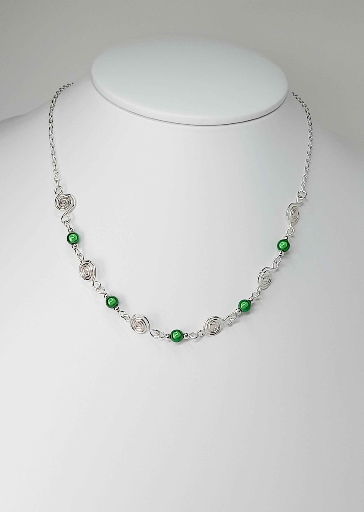 Dainty Silver Spiral Necklace with Green Miracle Beads,  Handmade Lightweight Jewellery