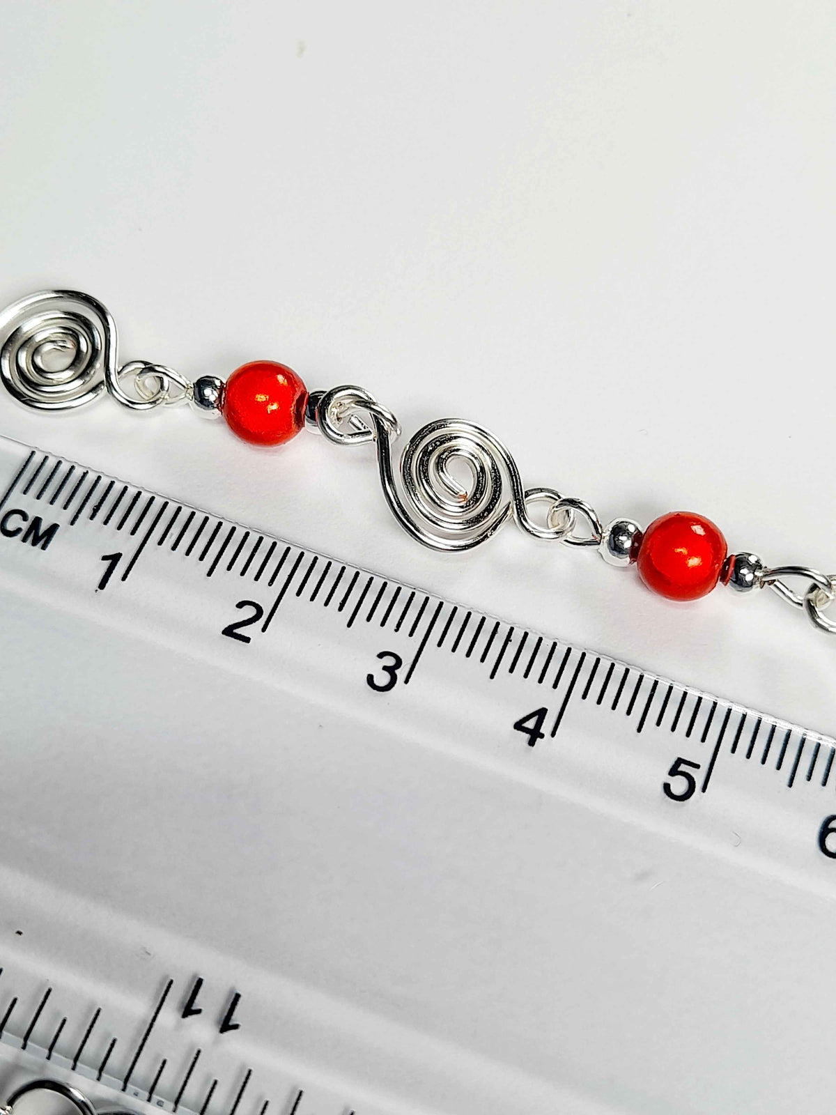 Dainty Silver Spiral Necklace with Red Miracle Beads,  Handmade Lightweight Jewellery
