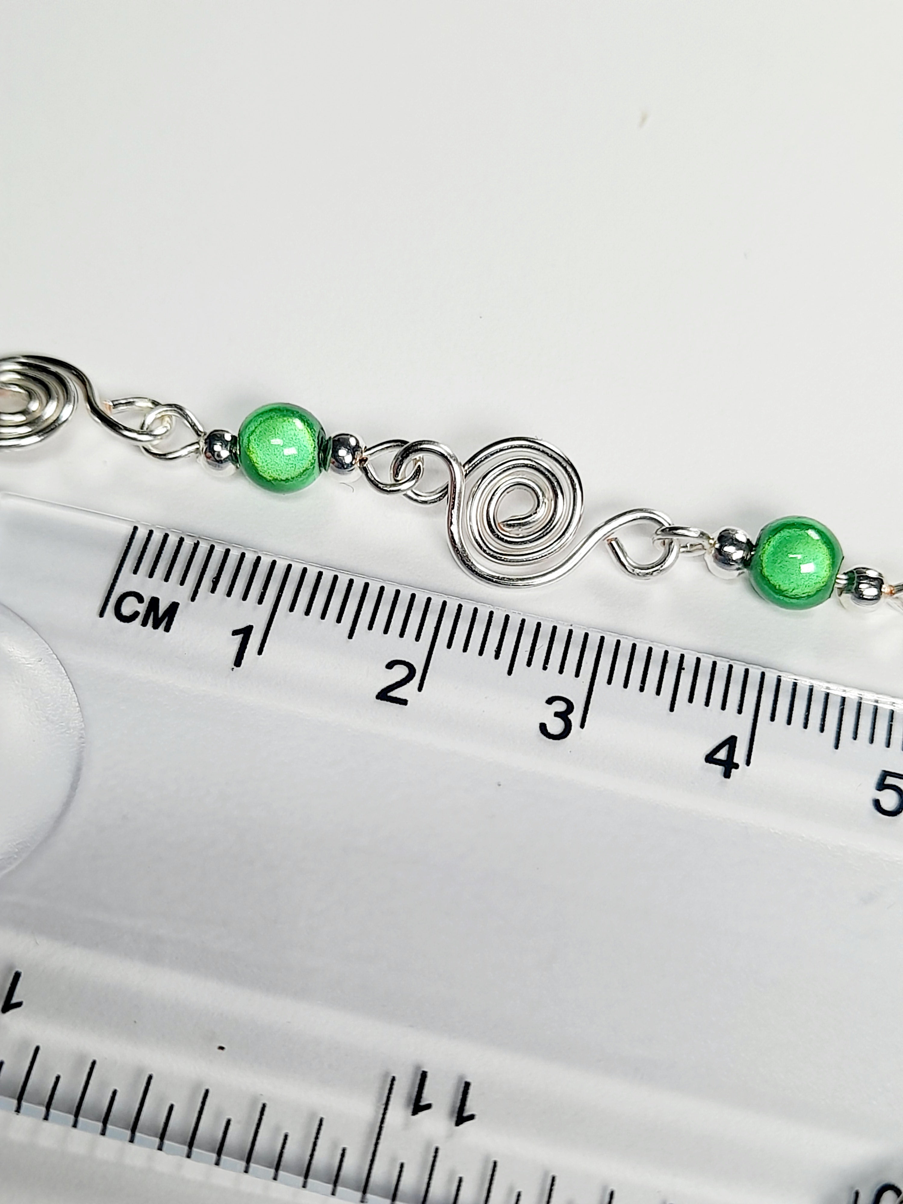 Dainty Silver Spiral Necklace with Green Miracle Beads,  Handmade Lightweight Jewellery