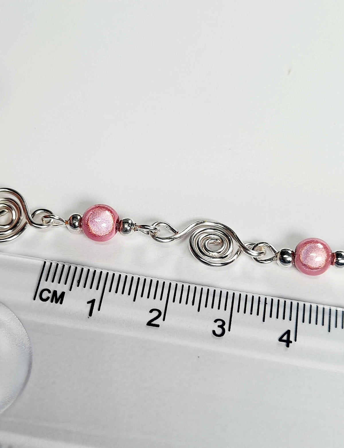 Dainty Silver Spiral Necklace with Pale Pink Miracle Beads,  Handmade Lightweight Jewellery