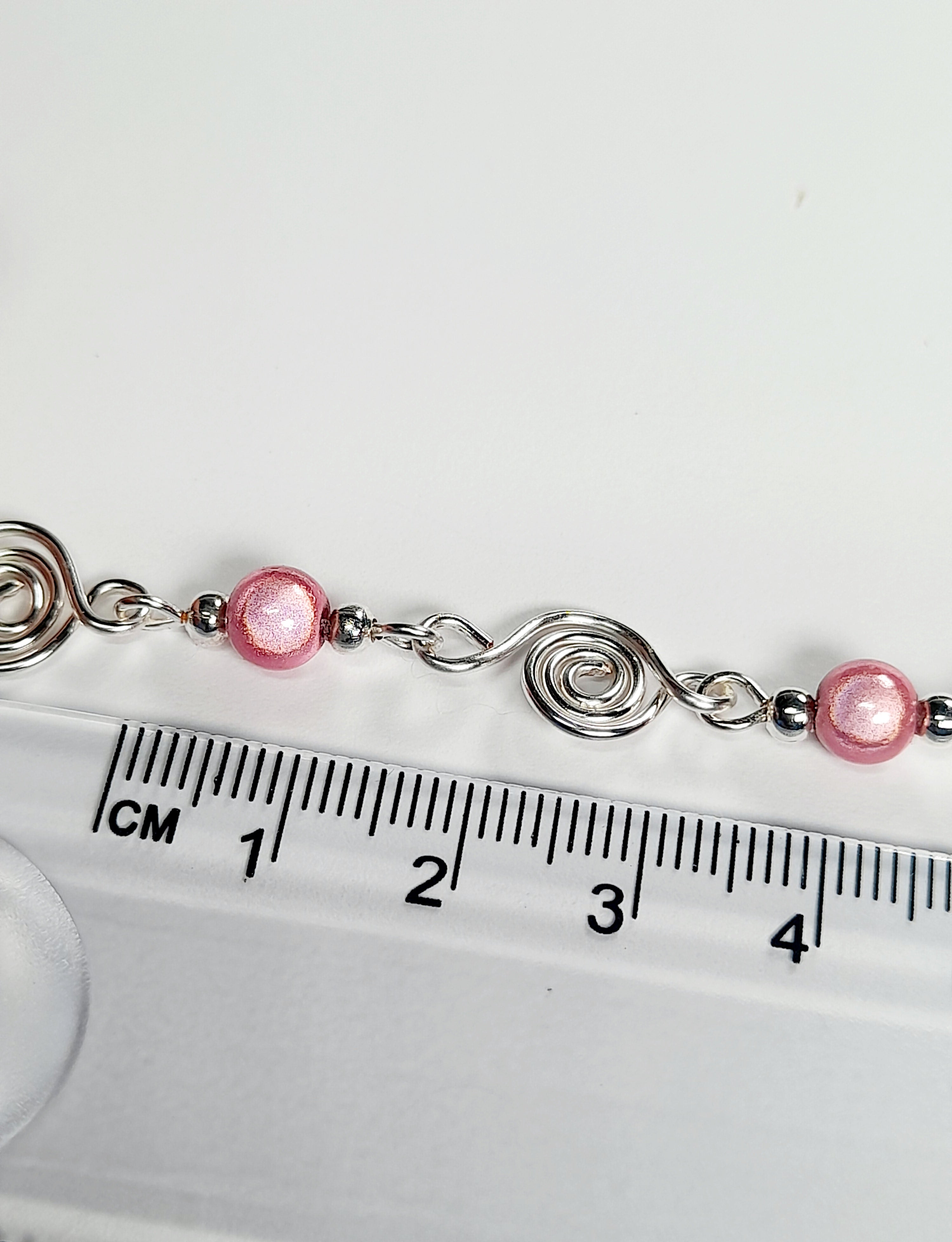 Dainty Silver Spiral Necklace with Pale Pink Miracle Beads,  Handmade Lightweight Jewellery
