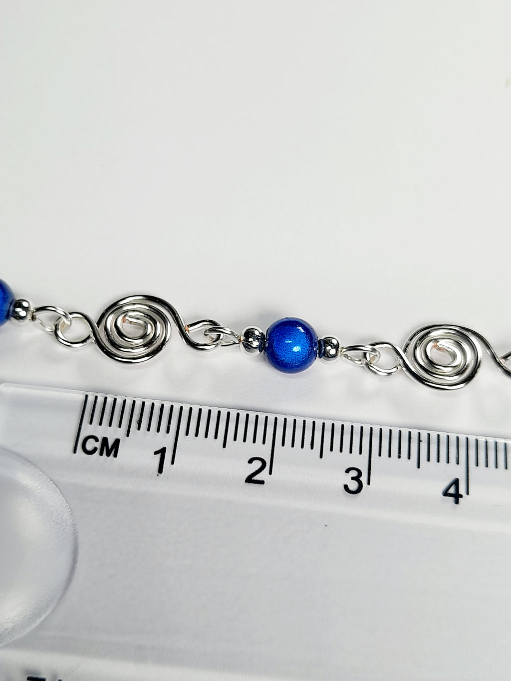 Dainty Silver Spiral Necklace with Blue Miracle Beads,  Handmade Lightweight Jewellery
