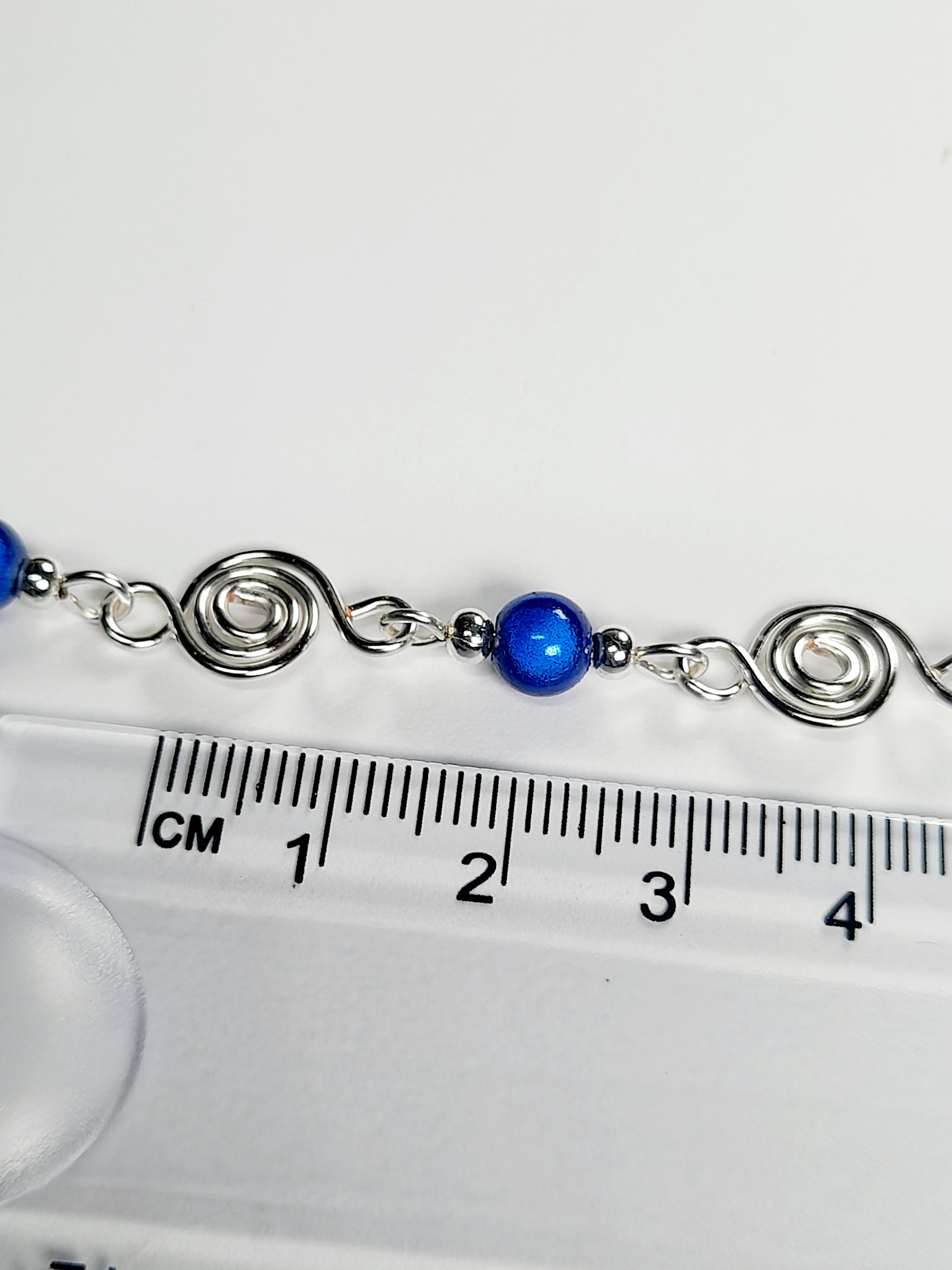 Dainty Silver Spiral Necklace with Blue Miracle Beads,  Handmade Lightweight Jewellery
