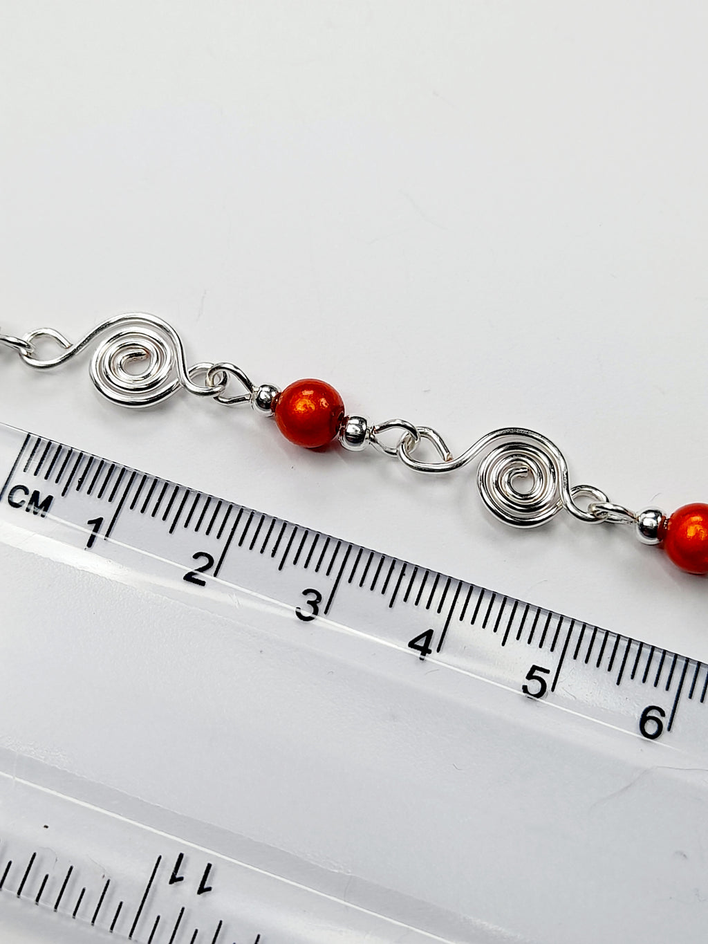 Dainty Silver Spiral & Orange Bracelet, Handmade Adjustable Design