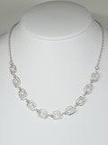 Dainty Super Swirly Silver Square Spiral Necklace