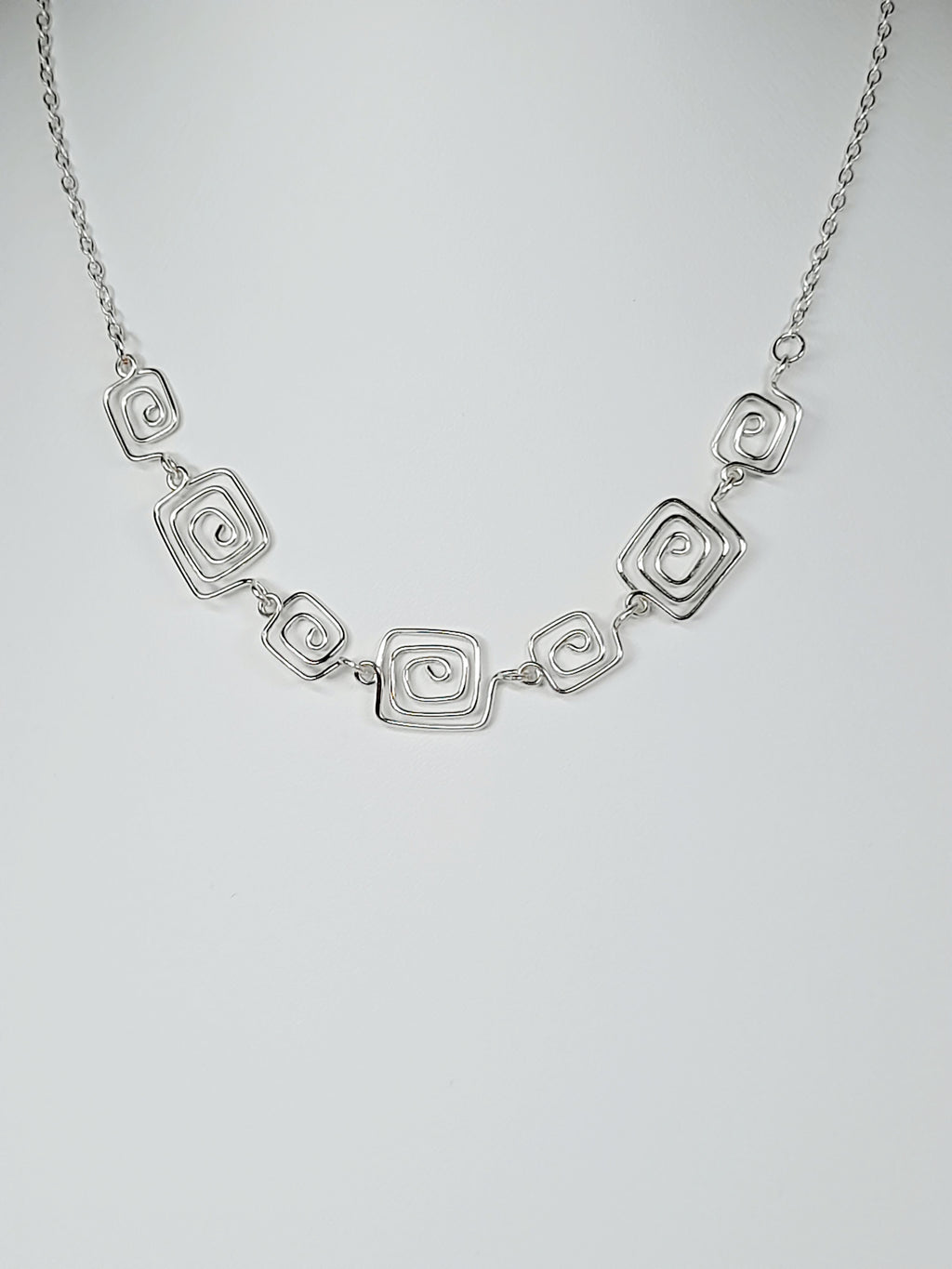 Handmade Silver Square Spiral Necklace, Elegant Swirly Lightweight Statement Jewellery