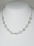 Delicate Silver Swirl Necklace with Tiny Handmade Spirals