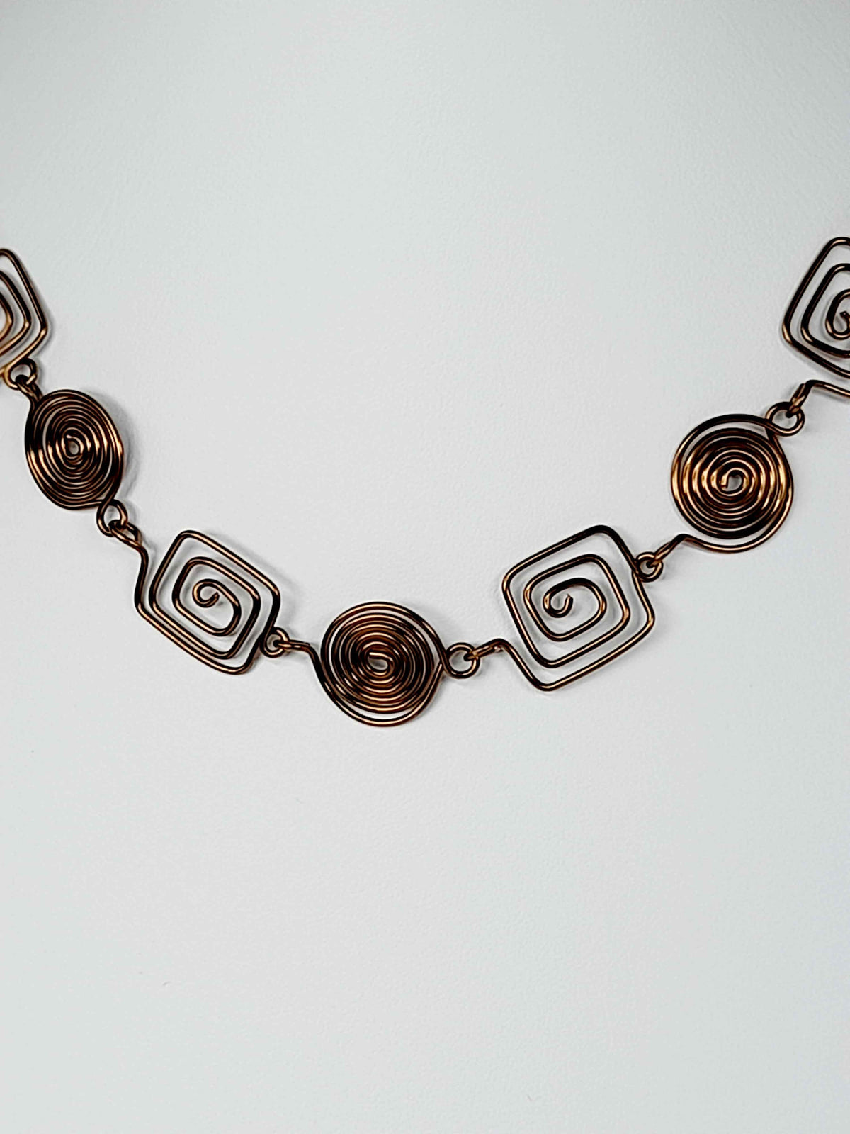 Super Swirly Bronze Round & Square Spiral Necklace