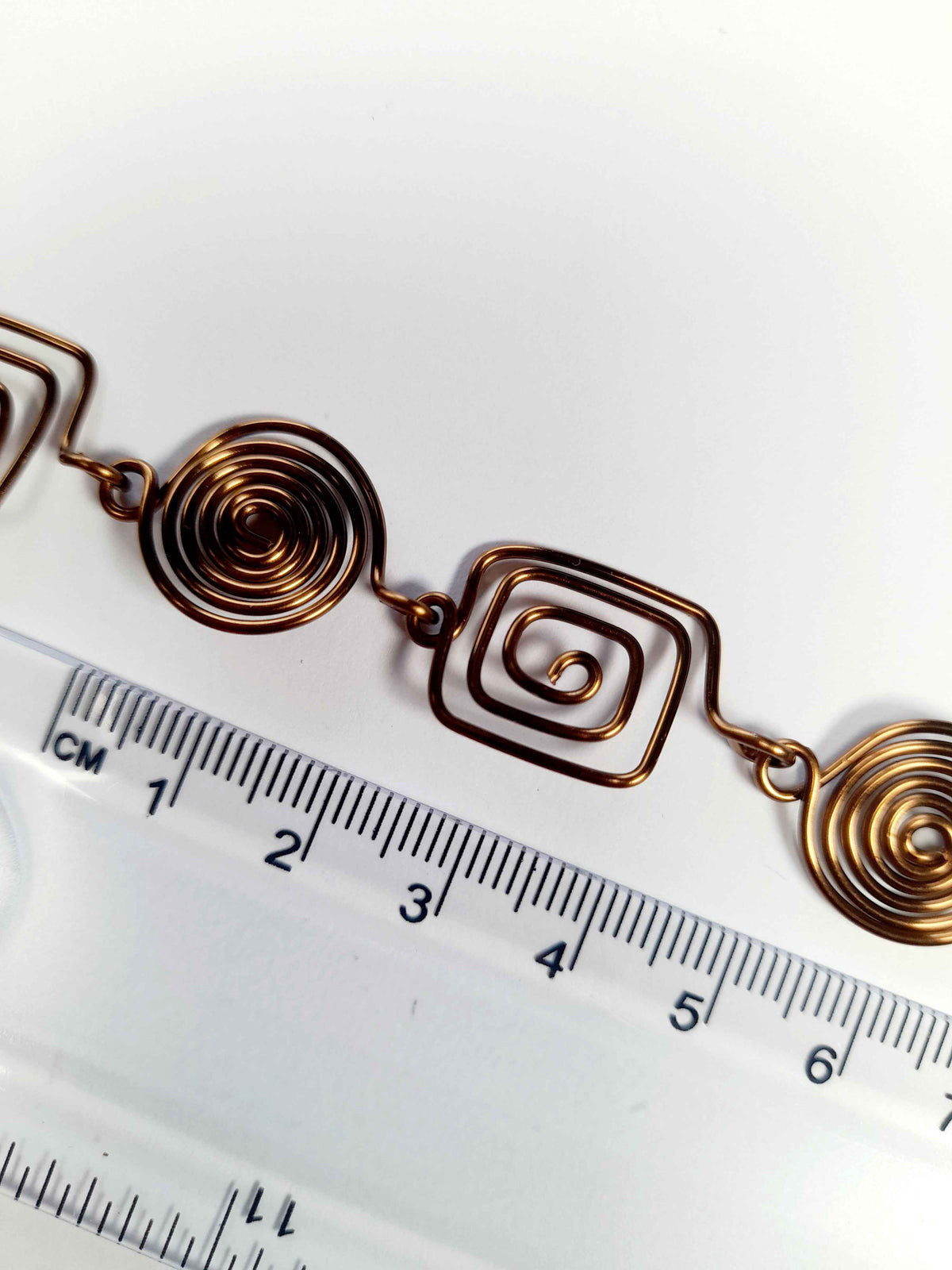Super Swirly Bronze Round & Square Spiral Necklace