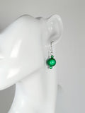 Handmade Silver Dangle Earrings with Green Luminescent Beads