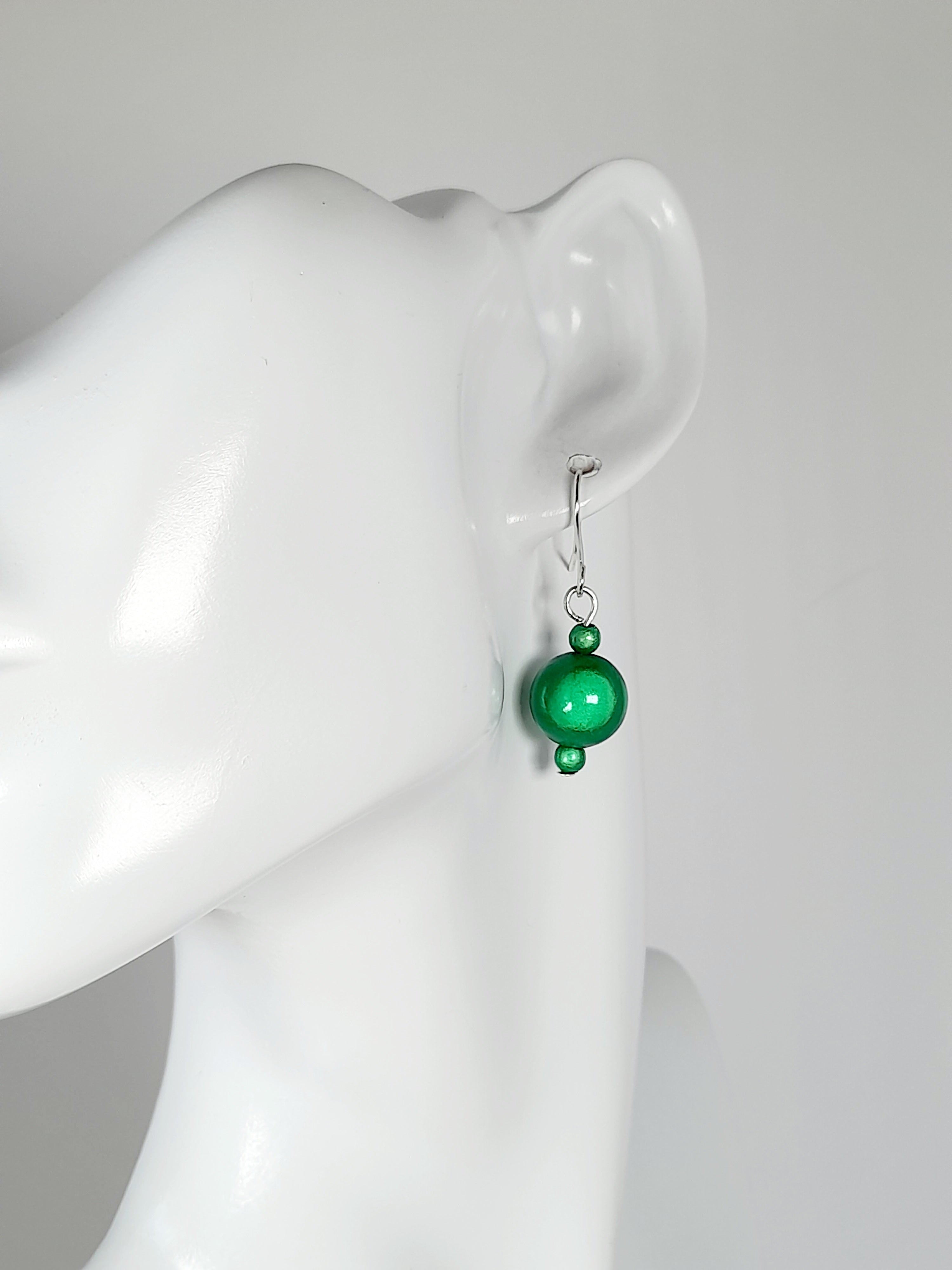 Handmade Silver Dangle Earrings with Green Luminescent Beads