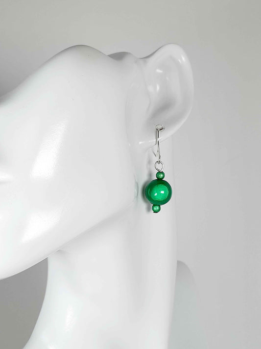Handmade Silver Dangle Earrings with Green Luminescent Beads