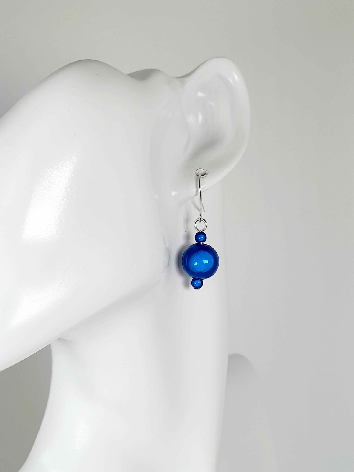 Handmade Silver Dangle Earrings with Blue Luminescent Beads