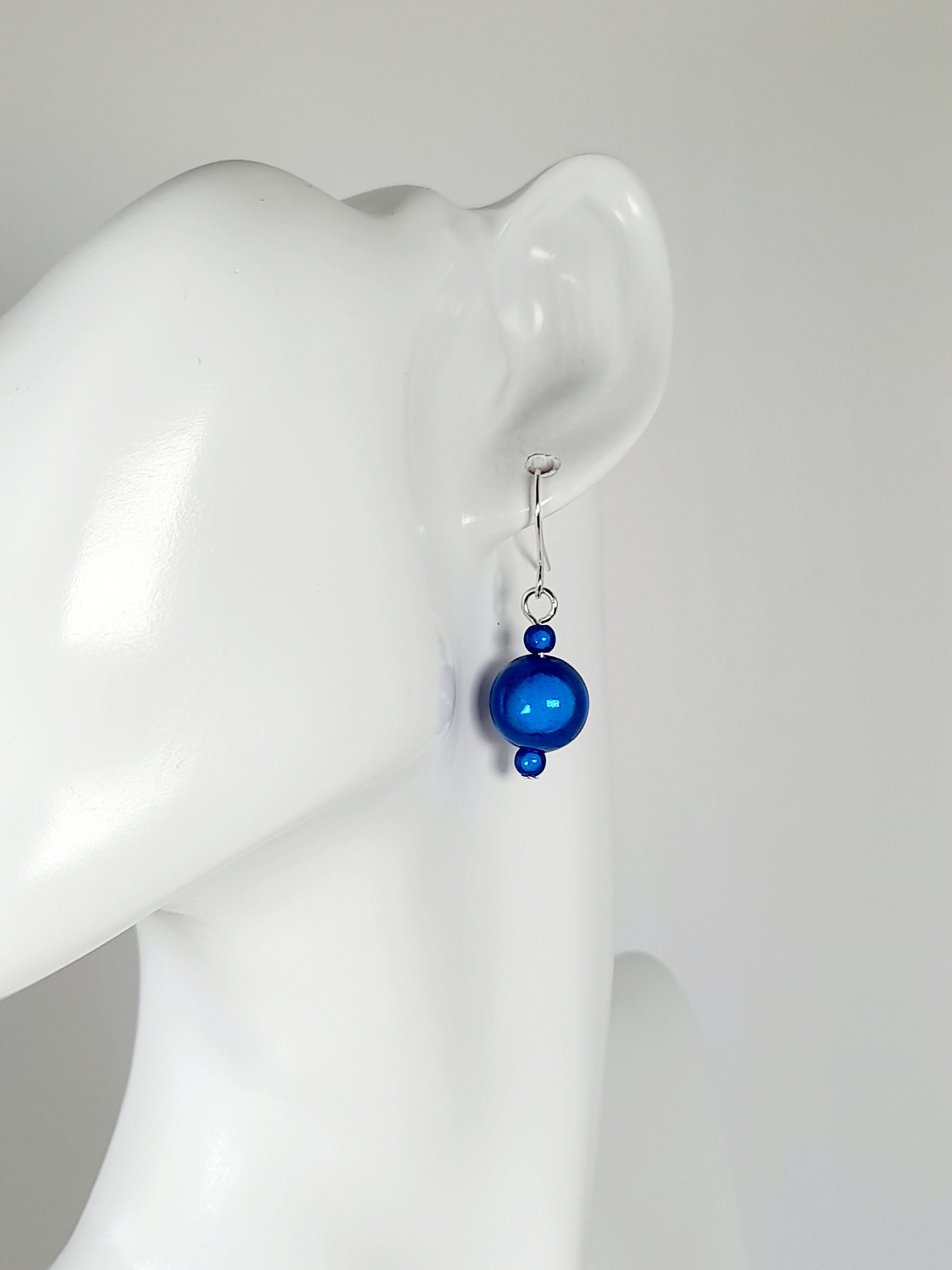 Handmade Silver Dangle Earrings with Blue Luminescent Beads