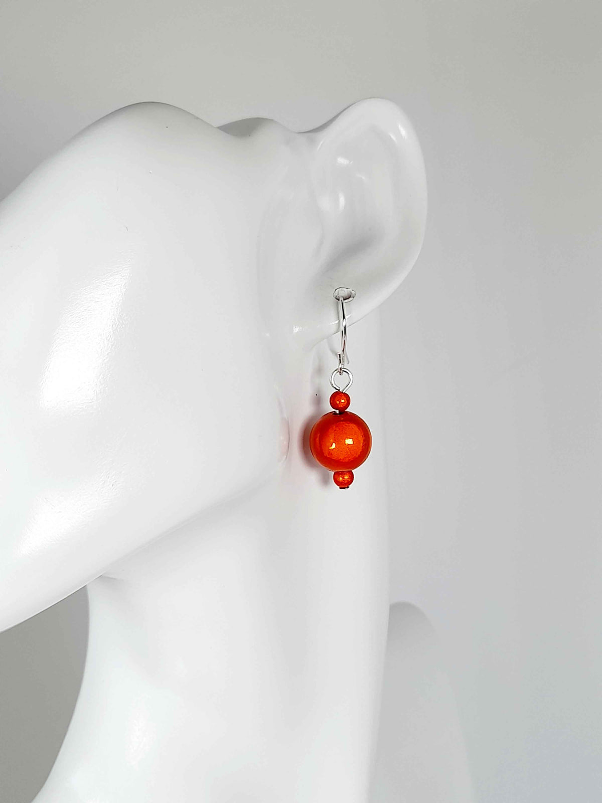 Handmade Silver Dangle Earrings with Orange Luminescent Beads