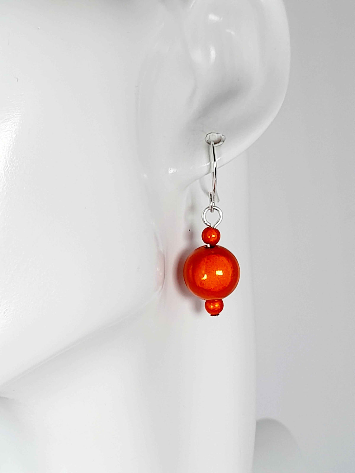 Handmade Silver Dangle Earrings with Orange Luminescent Beads