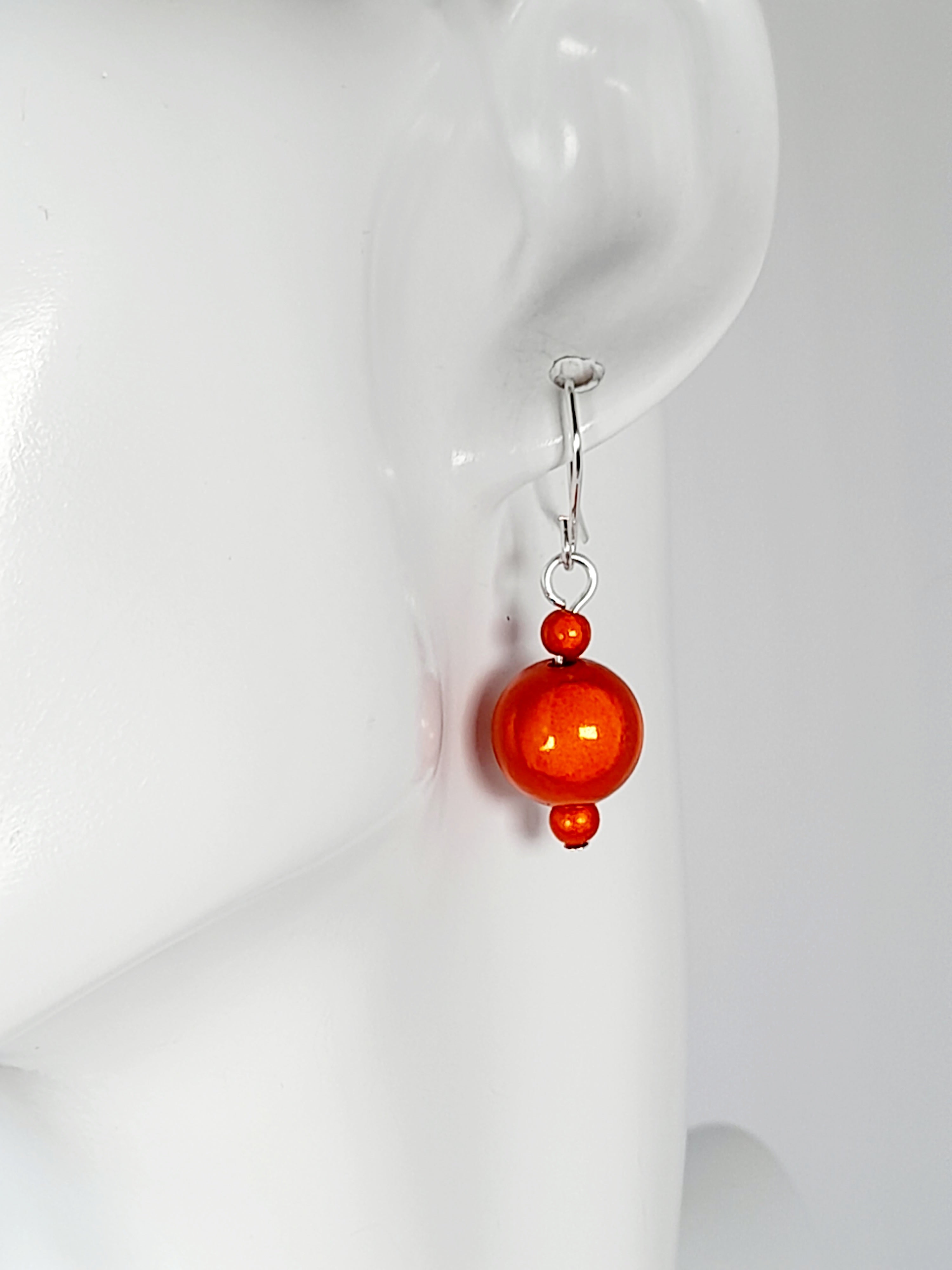 Handmade Silver Dangle Earrings with Orange Luminescent Beads