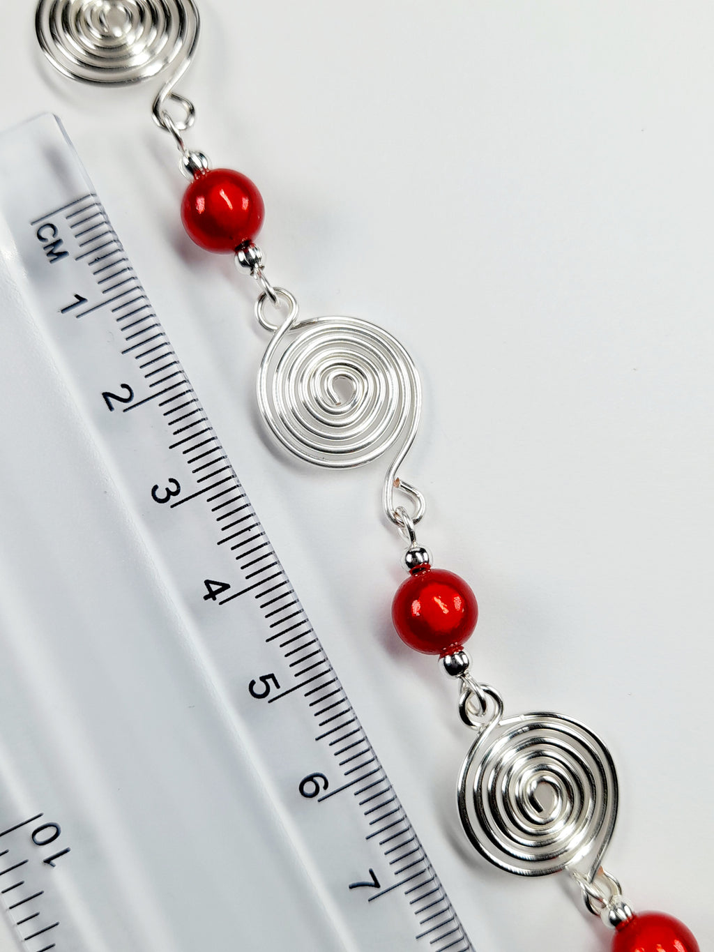 Dainty Silver Spiral & Red Bead Bracelet – Handmade Adjustable Design