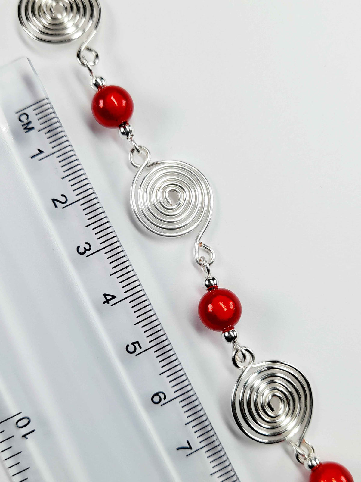 Dainty Silver Spiral & Red Bead Bracelet – Handmade Adjustable Design