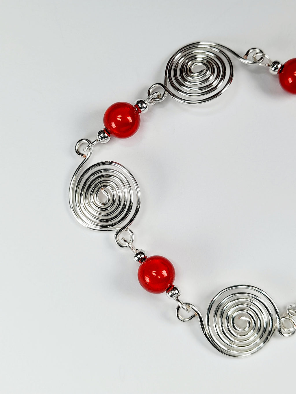 Dainty Silver Spiral & Red Bead Bracelet – Handmade Adjustable Design