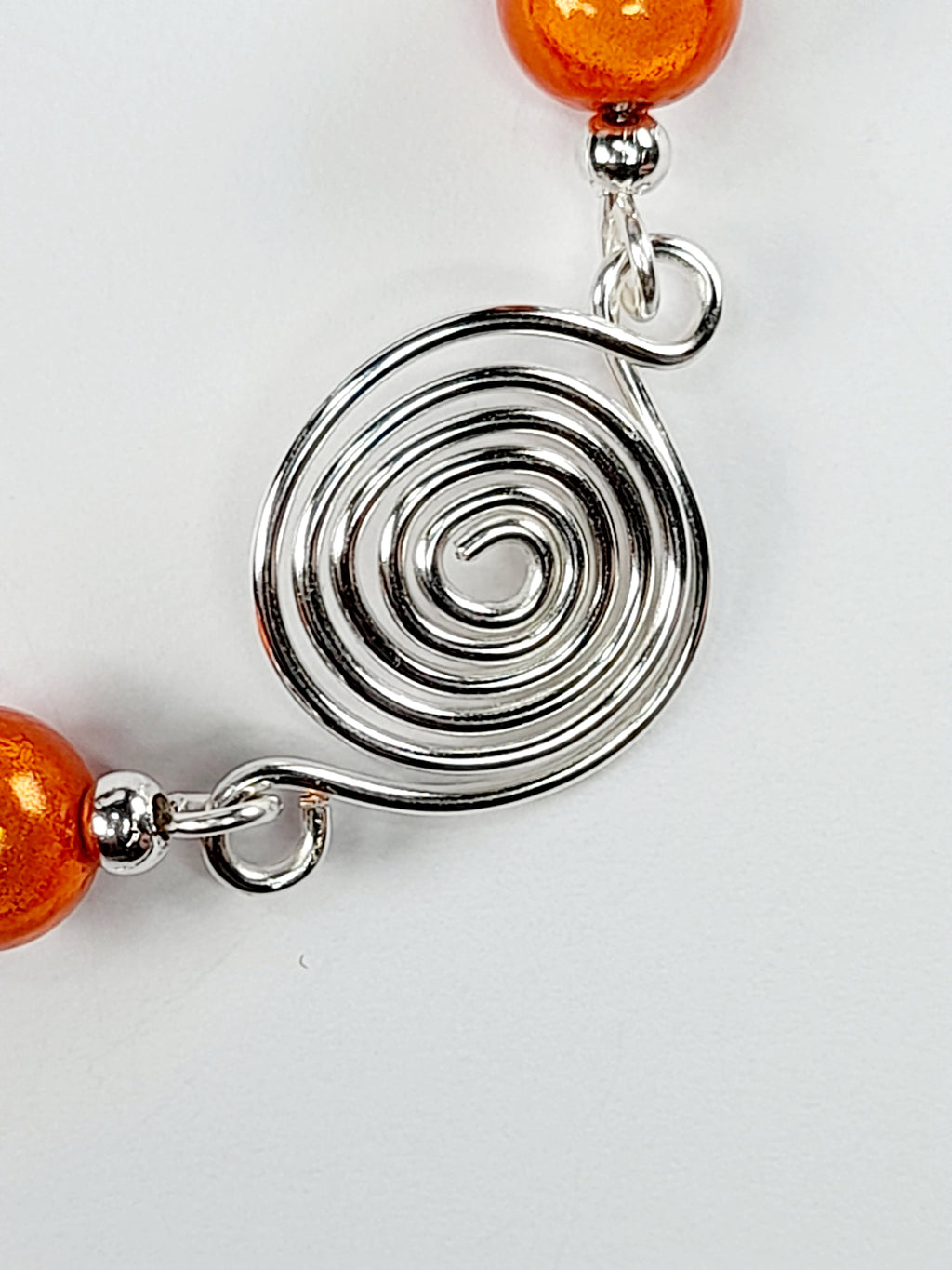 Dainty Silver Spiral & Orange Bead Bracelet – Handmade Adjustable Design