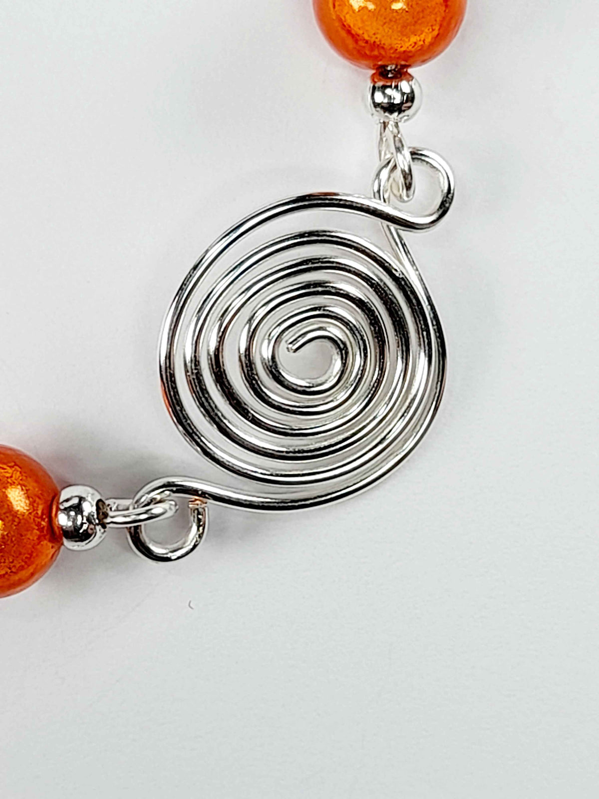 Dainty Silver Spiral & Orange Bead Bracelet – Handmade Adjustable Design