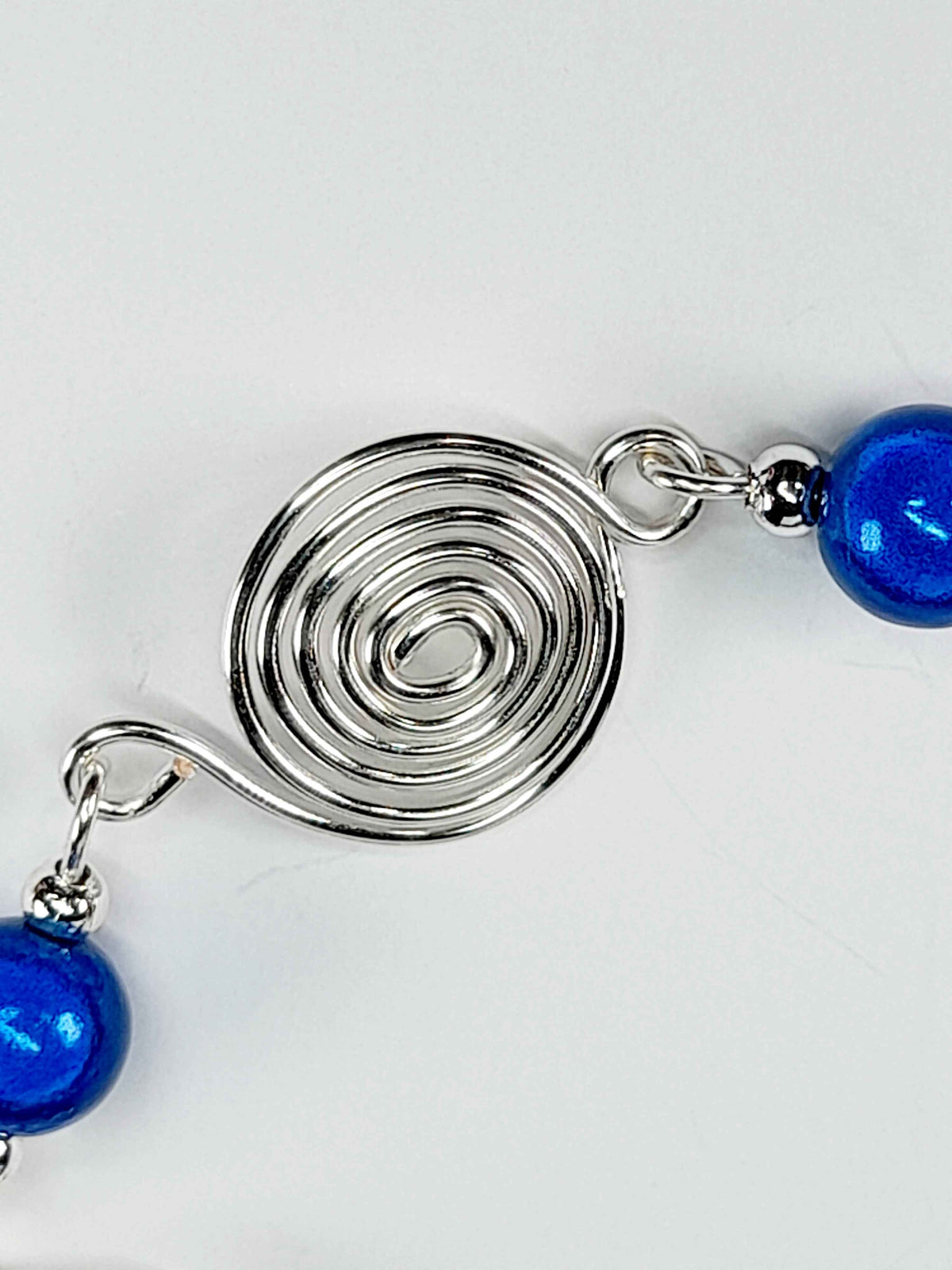 Dainty Silver Spiral & Blue Bead Bracelet – Handmade Adjustable Design
