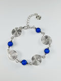 Dainty Silver Spiral & Blue Bead Bracelet – Handmade Adjustable Design