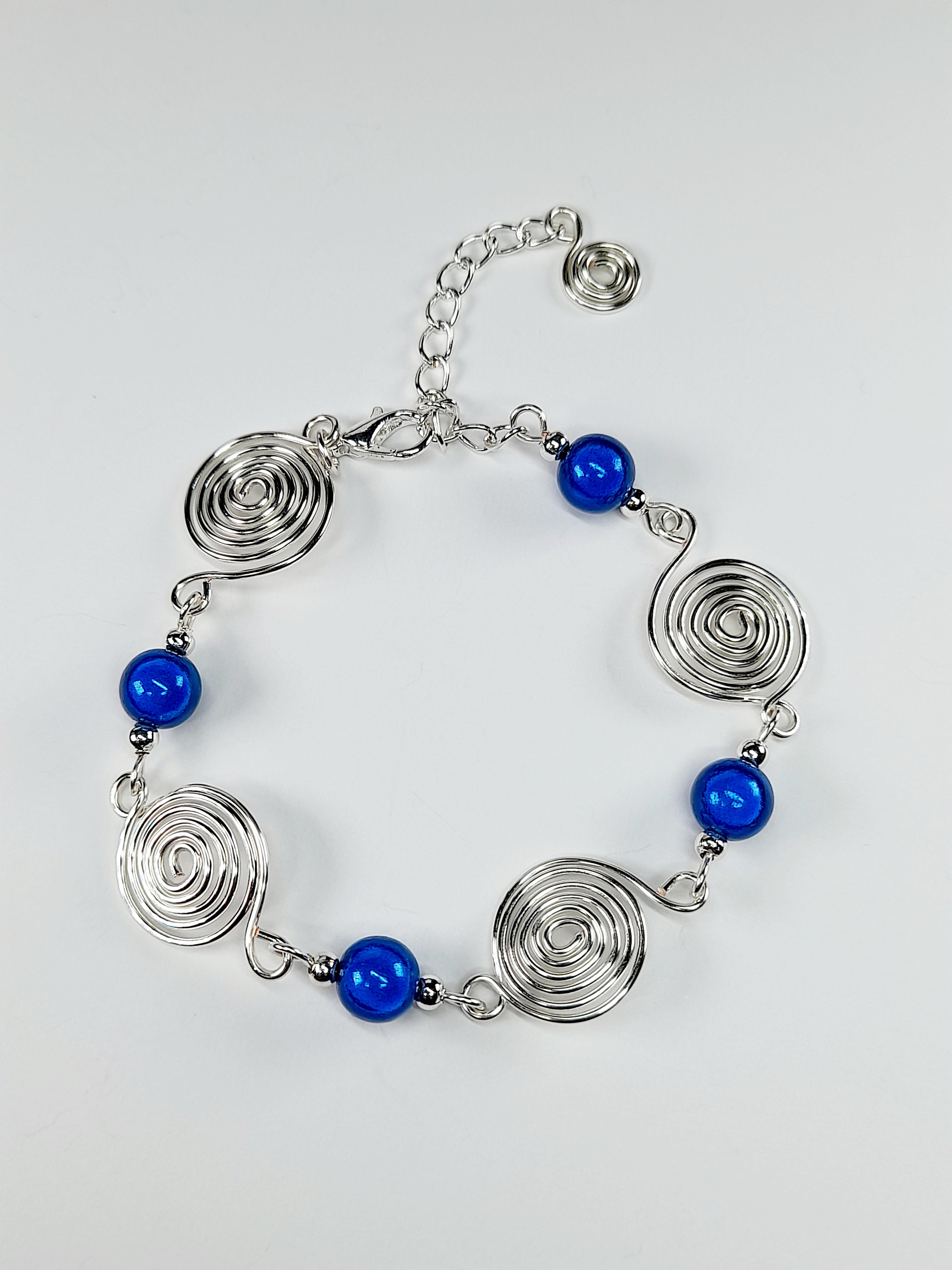 Dainty Silver Spiral & Blue Bead Bracelet – Handmade Adjustable Design