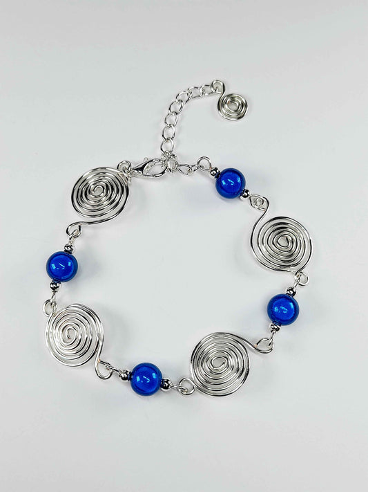Dainty Silver Spiral & Blue Bead Bracelet – Handmade Adjustable Design